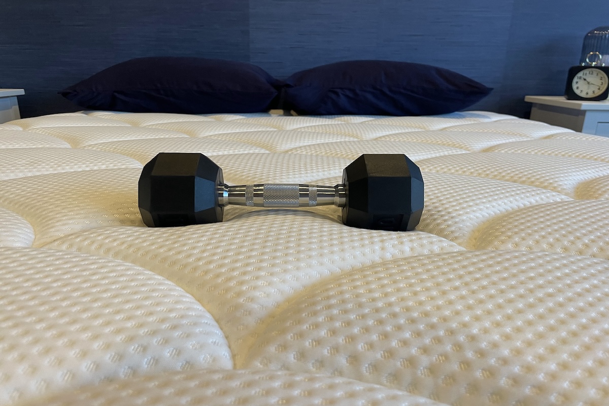 A 10-pound weight on the DreamCloud mattress in our testing facility