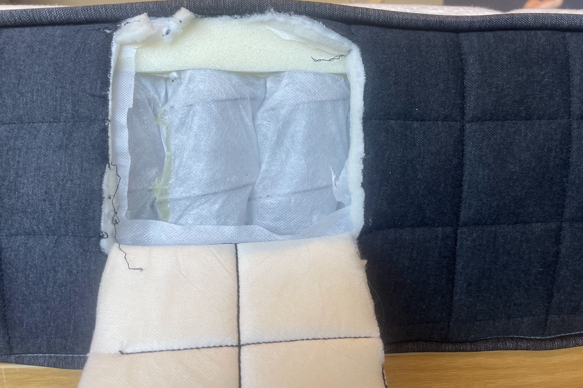 Hole cut in the side of Helix Midnight mattress