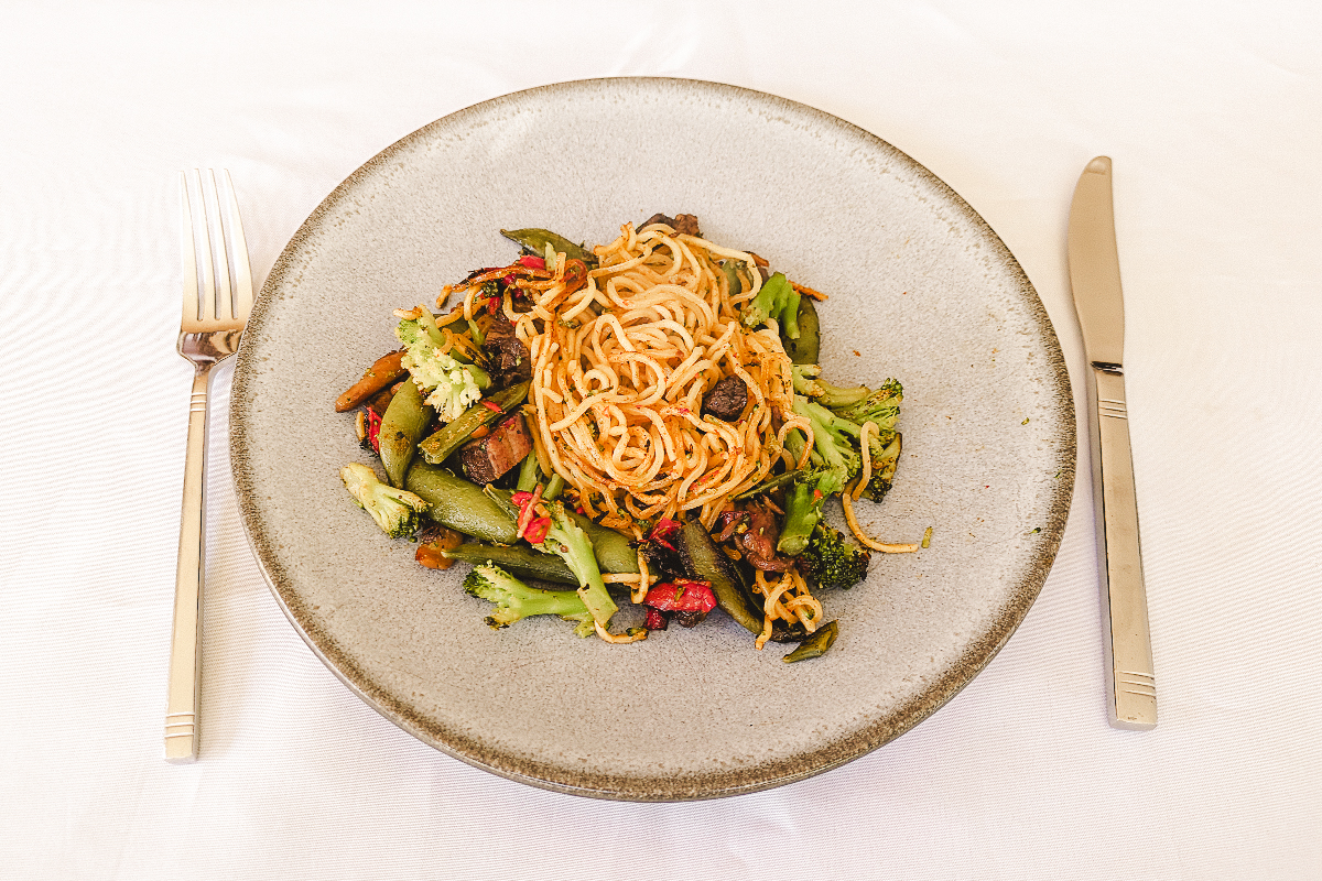 Image of the plated beef, broccoli, and lo-mein dinner