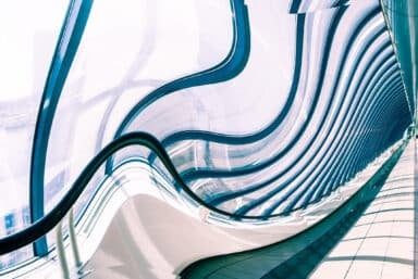 Warped view of a glazed corridor in an office center, representing schizophrenia signs and symptoms