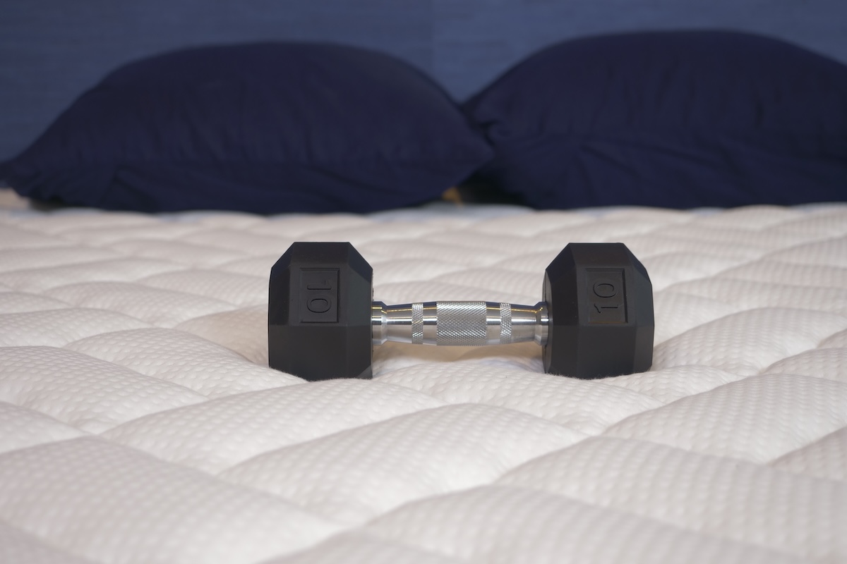 10-pound dumbbell on Titan Plus mattress.